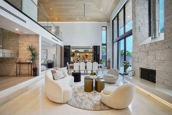 Dining room, Fireplace, Interior, Living room, Recessed Lighting, Stone Walls, Wooden Ceilings