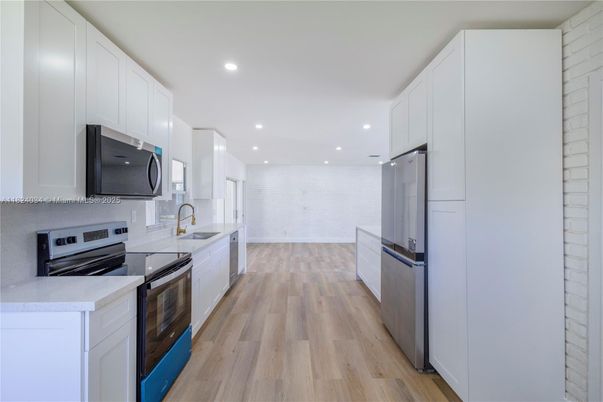 Interior, Kitchen, Recessed Lighting, Stainless Steel Appliances, Wood Texture Flooring
