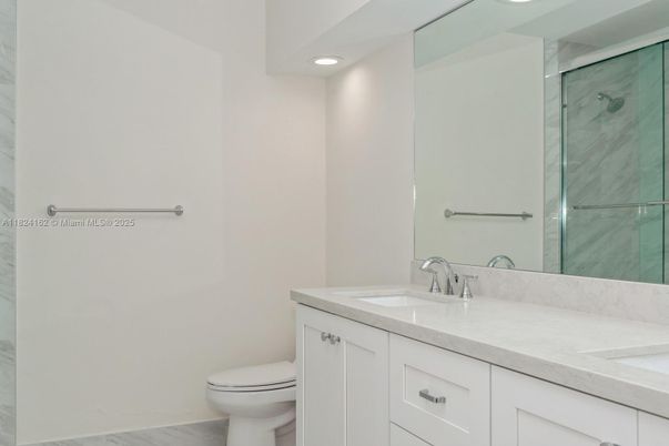 Bathroom, Dual Sink Vanities, Glass Shower, Interior, Marble, Recessed Lighting
