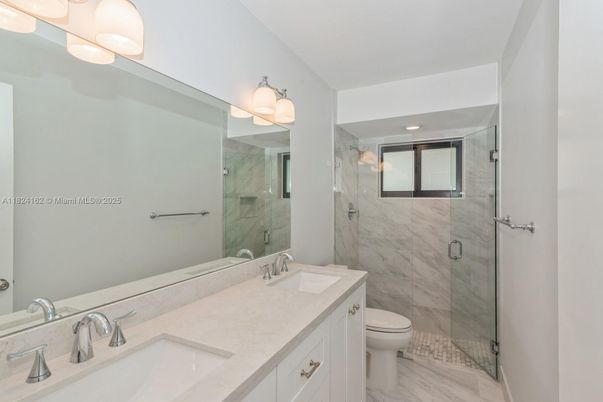 Bathroom, Dual Sink Vanities, Glass Shower, Interior, Marble, Marble Walls