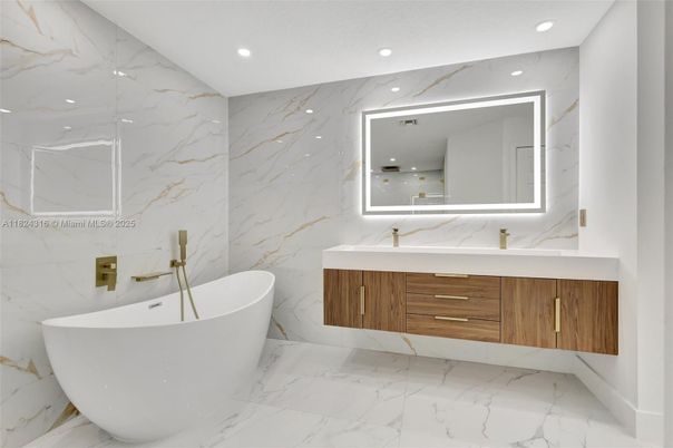 Bathroom, Dual Sink Vanities, Free Standing Baths, Interior, Marble, Marble Walls, Recessed Lighting