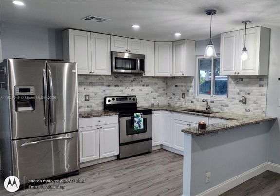 Interior, Kitchen, Pendant Lights, Recessed Lighting, Stainless Steel Appliances, Wood Texture Flooring