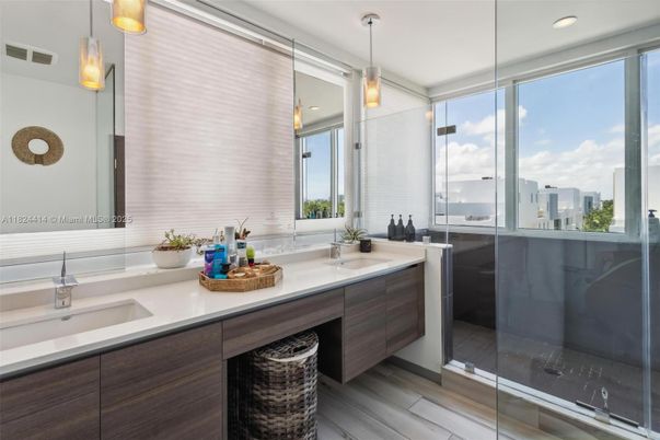 Bathroom, Dual Sink Vanities, Interior, Pendant Lights, Recessed Lighting, Wood Texture Flooring