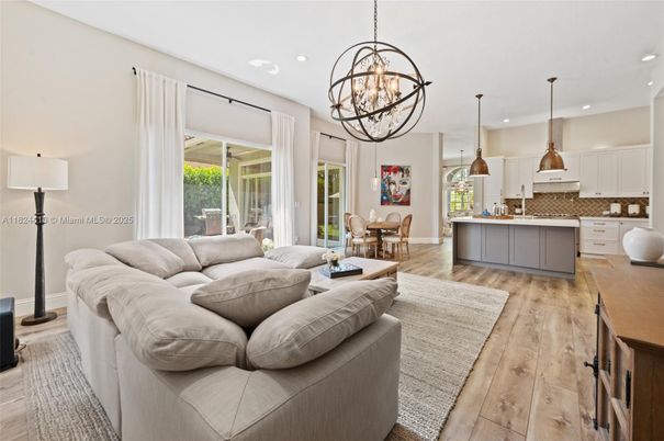 Chandelier, Dining room, Interior, Kitchen, Living room, Pendant Lights, Recessed Lighting, Wood Texture Flooring