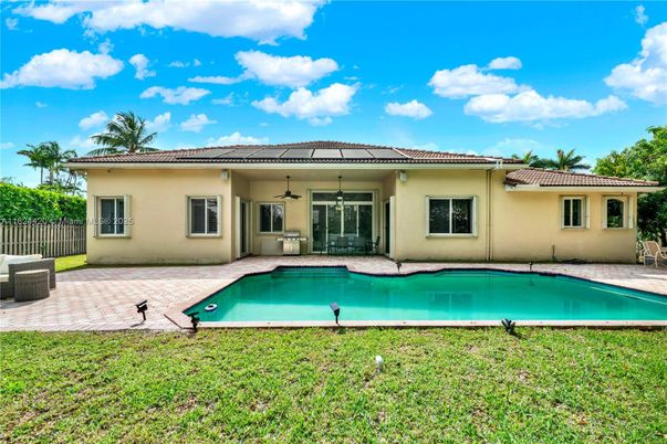 Exterior, Pool, Solar Panels
