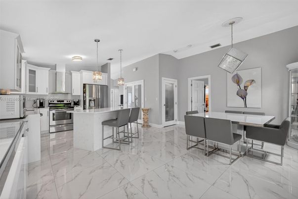 Dining room, Interior, Kitchen, Marble, Pendant Lights, Stainless Steel Appliances