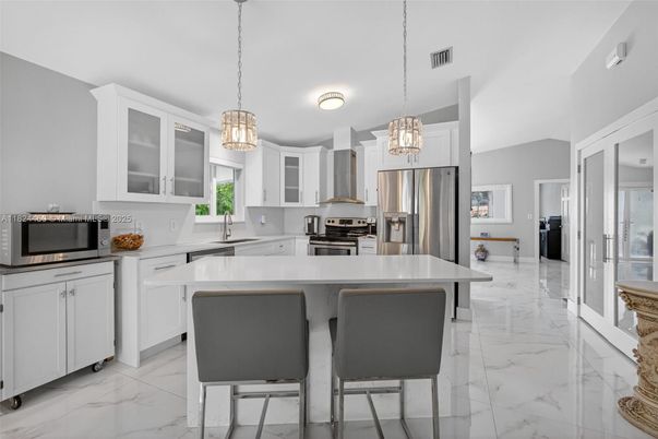 Interior, Kitchen, Marble, Pendant Lights, Stainless Steel Appliances