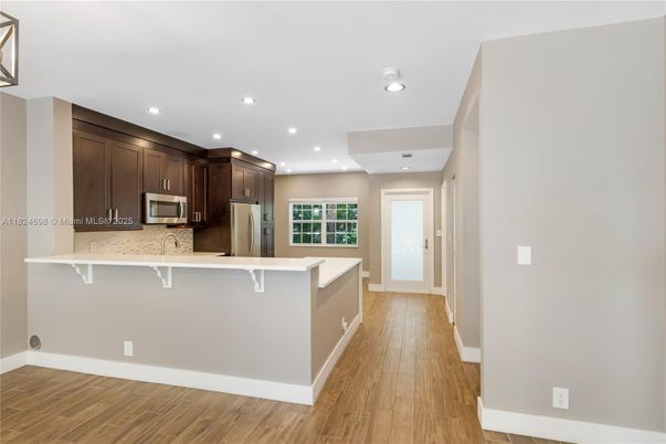 Interior, Kitchen, Recessed Lighting, Stainless Steel Appliances, Wood Texture Flooring