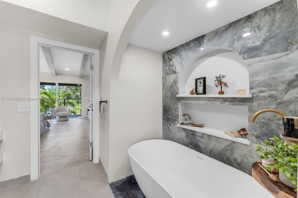 Bathroom, Free Standing Baths, Interior, Marble Walls, Recessed Lighting, Wood Texture Flooring