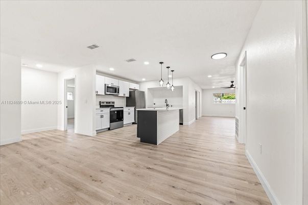 Interior, Kitchen, Pendant Lights, Recessed Lighting, Stainless Steel Appliances, Wood Texture Flooring