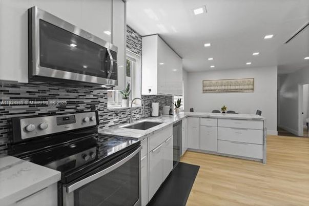 Interior, Kitchen, Recessed Lighting, Stainless Steel Appliances, Wood Texture Flooring