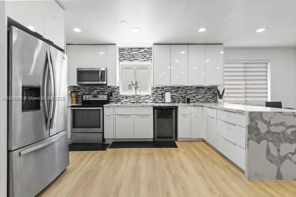 Interior, Kitchen, Recessed Lighting, Stainless Steel Appliances, Wood Texture Flooring