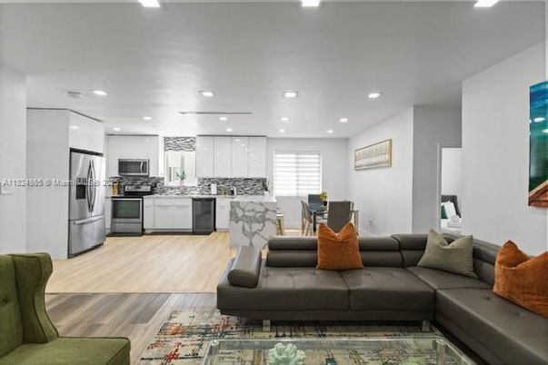 Dining room, Interior, Kitchen, Living room, Recessed Lighting, Stainless Steel Appliances, Wood Texture Flooring