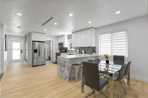 Dining room, Interior, Kitchen, Recessed Lighting, Stainless Steel Appliances, Wood Texture Flooring