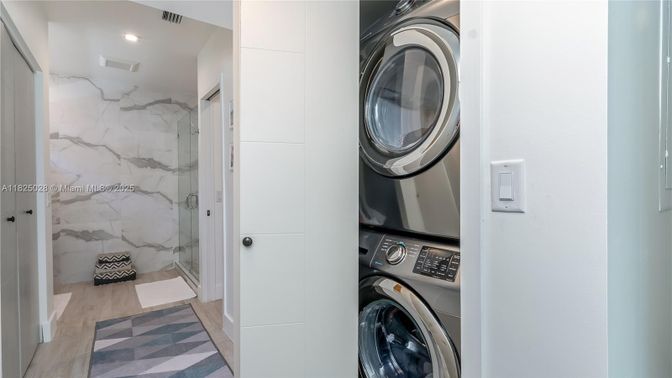 Bathroom, Interior, Marble Walls, Recessed Lighting, Utility Closets, Washer