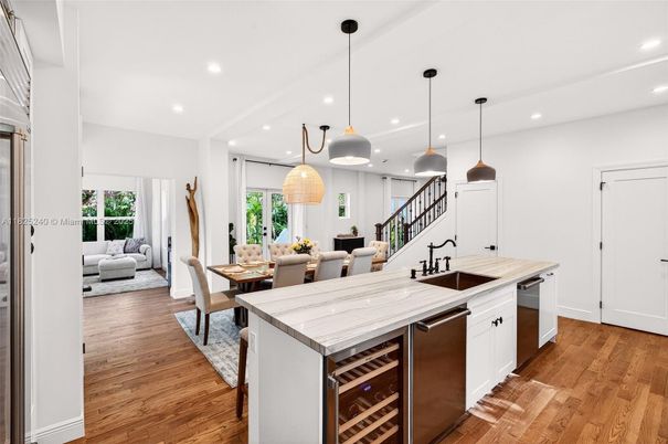 Dining room, Interior, Kitchen, Pendant Lights, Recessed Lighting, Stainless Steel Appliances, Wood Texture Flooring