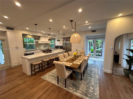 Dining room, Interior, Kitchen, Pendant Lights, Recessed Lighting, Stainless Steel Appliances, Wood Texture Flooring