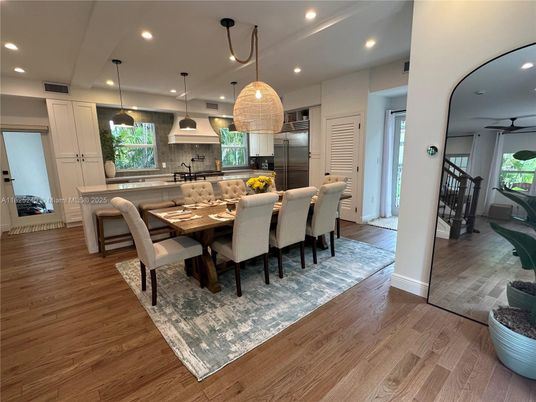Dining room, Interior, Kitchen, Pendant Lights, Recessed Lighting, Stainless Steel Appliances, Wood Texture Flooring