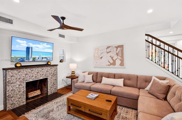 Fireplace, Interior, Living room, Recessed Lighting, Water, Wood Texture Flooring