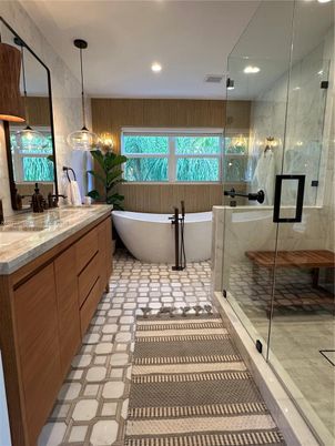 Bathroom, Dual Sink Vanities, Free Standing Baths, Glass Shower, Interior, Marble Walls, Pendant Lights, Recessed Lighting