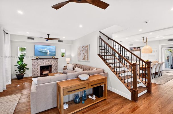 Dining room, Fireplace, Interior, Living room, Pendant Lights, Recessed Lighting, Wood Texture Flooring