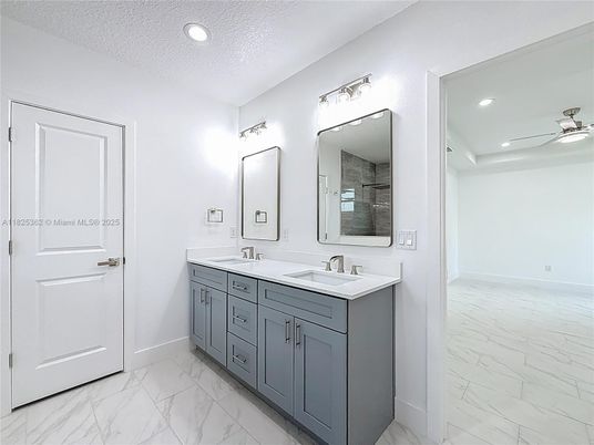 Bathroom, Dual Sink Vanities, Interior, Marble, Recessed Lighting