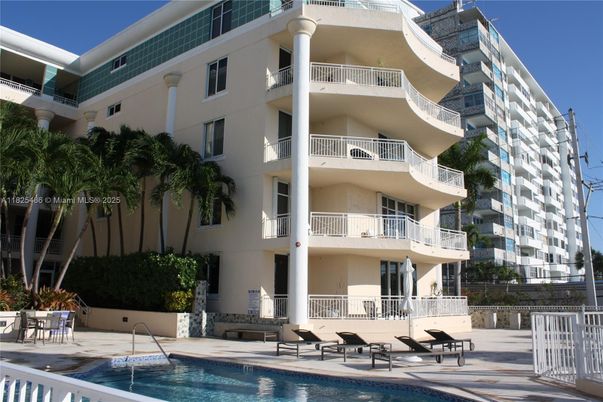 Exterior, Facade, Pool, Condo Building
