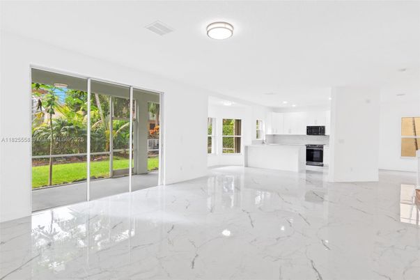 Empty room, Interior, Kitchen, Marble, Recessed Lighting, Stainless Steel Appliances