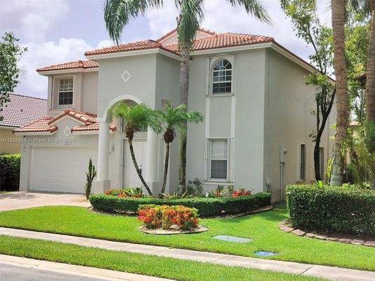 Attached, Exterior, Facade, Spanish Mediterranean
