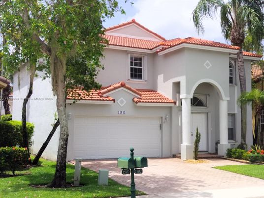 Attached, Exterior, Facade, Spanish Mediterranean