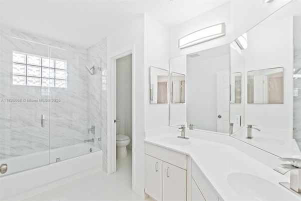 Bathroom, Dual Sink Vanities, Glass Shower, Interior, Marble Walls