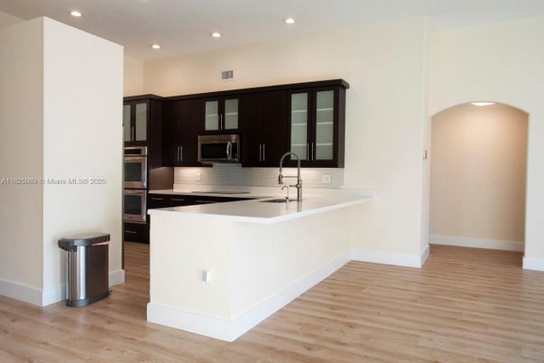 Interior, Kitchen, Recessed Lighting, Stainless Steel Appliances, Wood Texture Flooring