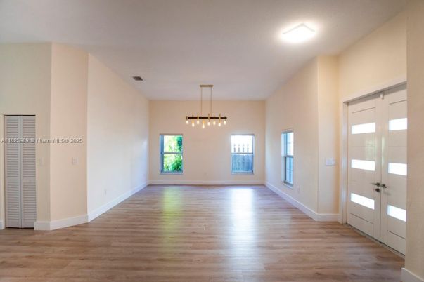 Empty room, Interior, Pendant Lights, Wood Texture Flooring