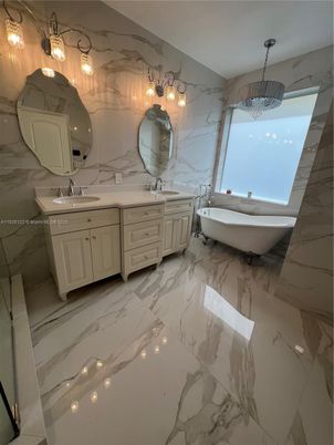 Bathroom, Dual Sink Vanities, Free Standing Baths, Interior, Marble, Marble Walls