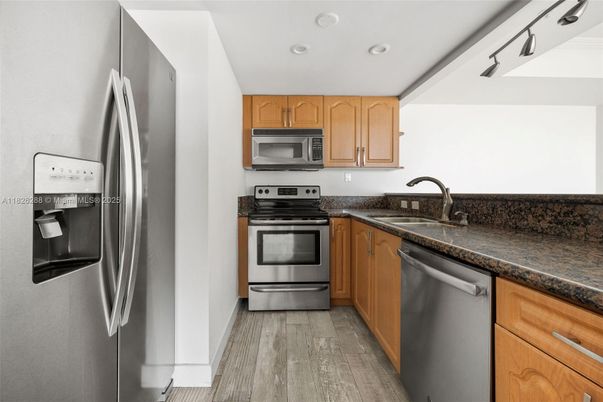 Interior, Kitchen, Recessed Lighting, Stainless Steel Appliances, Wood Texture Flooring