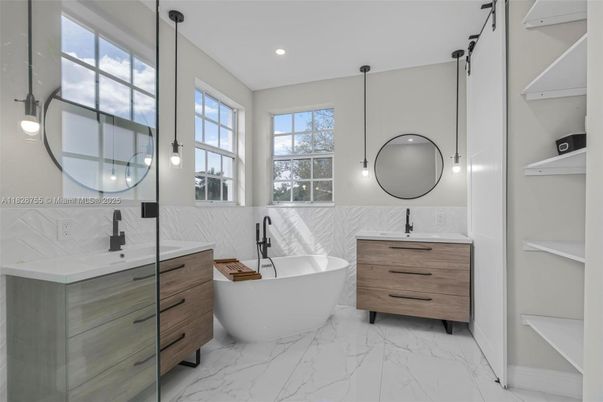 Bathroom, Dual Sink Vanities, Free Standing Baths, Interior, Marble, Pendant Lights, Recessed Lighting