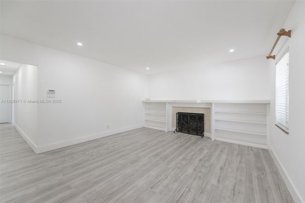 Empty room, Fireplace, Interior, Recessed Lighting, Wood Texture Flooring
