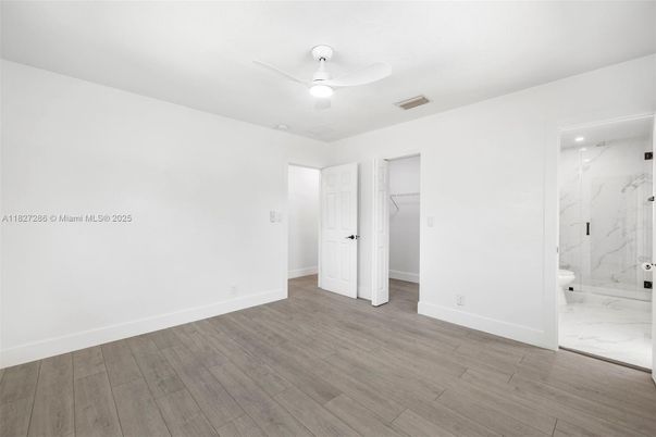Bathroom, Empty room, Interior, Marble, Marble Walls, Recessed Lighting, Wood Texture Flooring