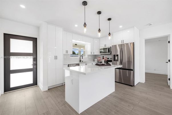 Interior, Kitchen, Pendant Lights, Recessed Lighting, Stainless Steel Appliances, Wood Texture Flooring