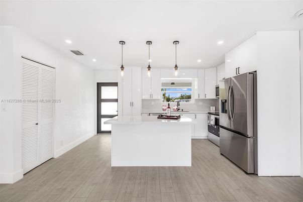 Interior, Kitchen, Pendant Lights, Recessed Lighting, Stainless Steel Appliances, Wood Texture Flooring