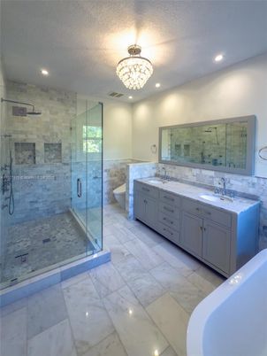 Bathroom, Dual Sink Vanities, Glass Shower, Interior, Marble, Recessed Lighting
