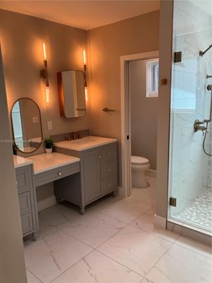 Bathroom, Dual Sink Vanities, Glass Shower, Interior, Marble, Marble Walls