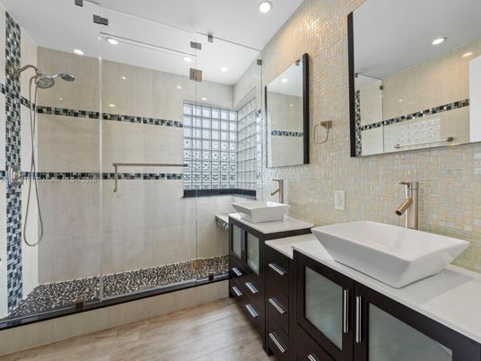 Bathroom, Dual Sink Vanities, Glass Shower, Interior, Recessed Lighting, Wood Texture Flooring