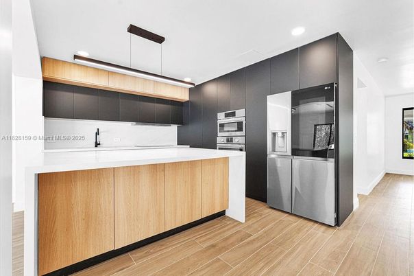 Interior, Kitchen, Pendant Lights, Recessed Lighting, Stainless Steel Appliances, Wood Texture Flooring