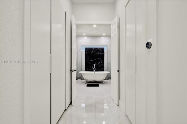 Bathroom, Free Standing Baths, Interior, Marble, Marble Walls, Recessed Lighting