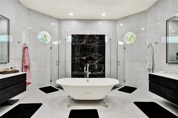 Bathroom, Free Standing Baths, Glass Shower, Interior, Marble Walls, Recessed Lighting