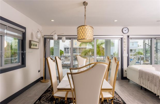 Bedroom, Dining room, Interior, Pendant Lights, Recessed Lighting, Wood Texture Flooring