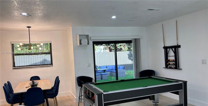 Billiard Table, Dining room, Game Room, Interior, Pendant Lights, Recessed Lighting, Wood Texture Flooring