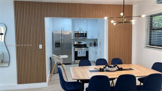 Dining room, Interior, Kitchen, Pendant Lights, Stainless Steel Appliances, Wood Texture Flooring