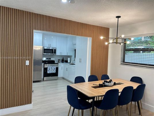 Dining room, Interior, Kitchen, Pendant Lights, Stainless Steel Appliances, Wood Texture Flooring